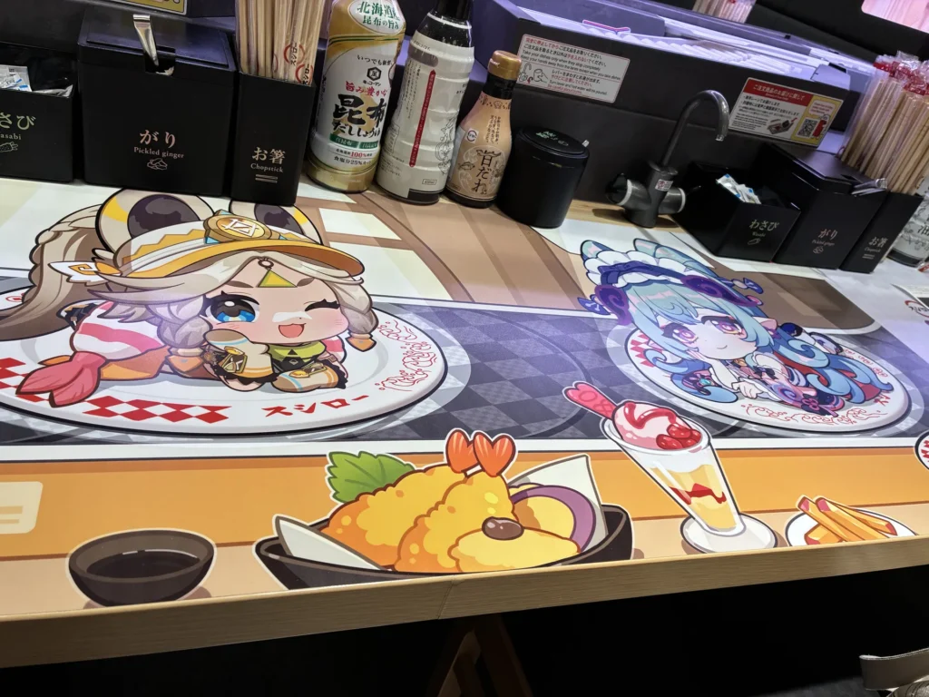 原神×スシローコラボ2025年スペシャルコラボ店舗限定のテーブルにはコラボキャラがペイントされている